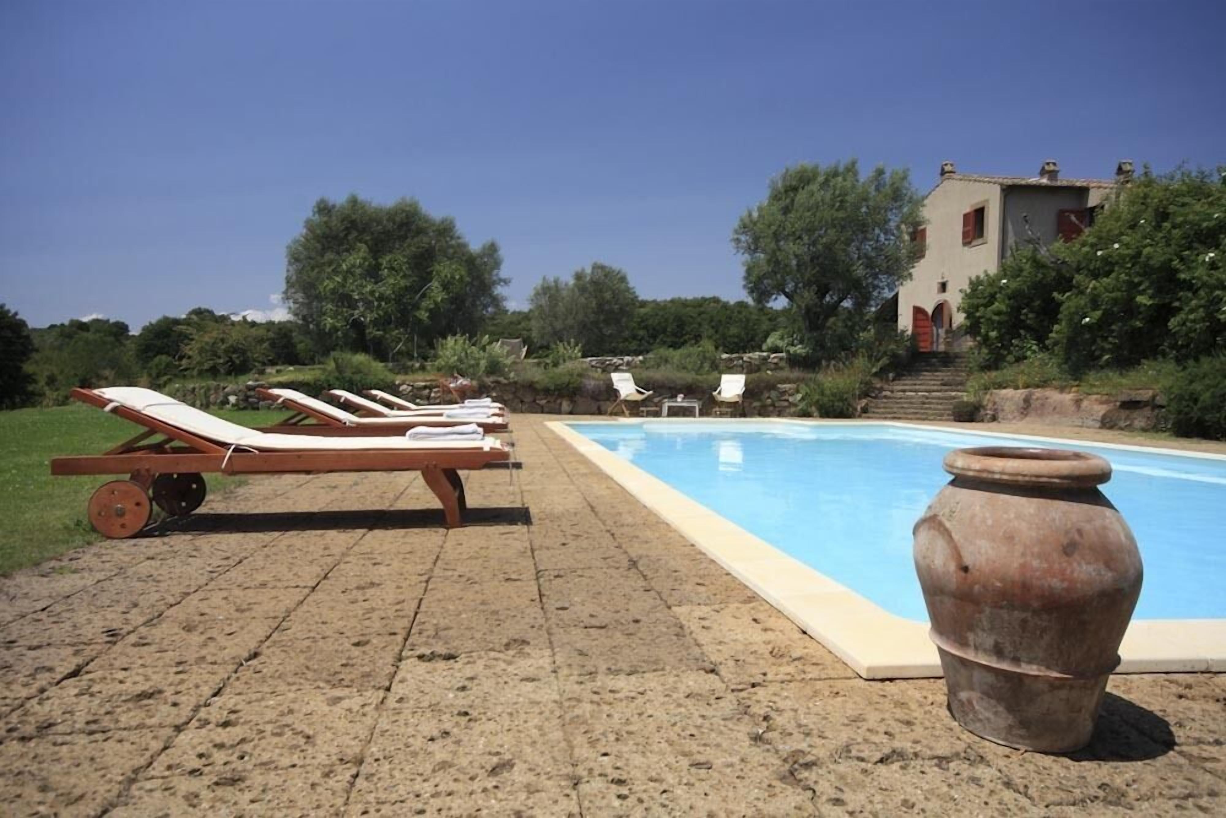 Seasonal outdoor pool, pool umbrellas, sun loungers