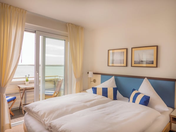 Quadruple Room, 1 Double Bed with Sofa bed, Balcony | Desk, laptop workspace, free WiFi, bed sheets