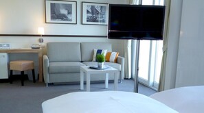 Desk, laptop workspace, free WiFi, bed sheets