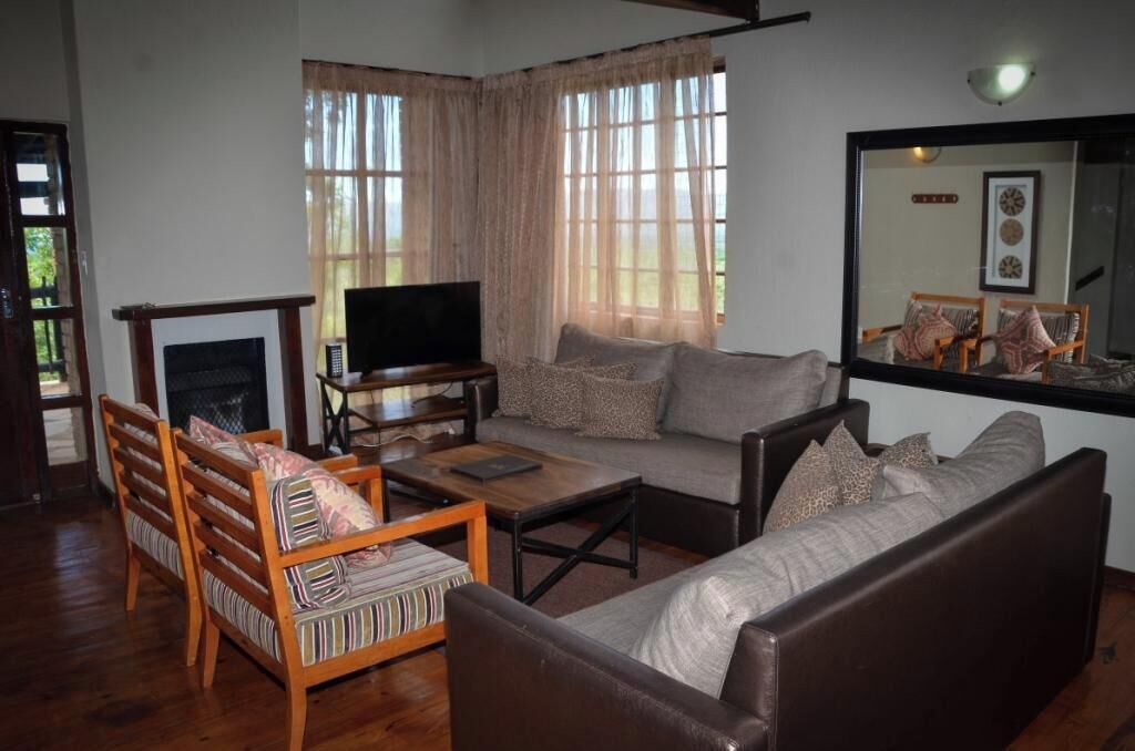 Basic Condo | Living area | 32-inch plasma TV with cable channels