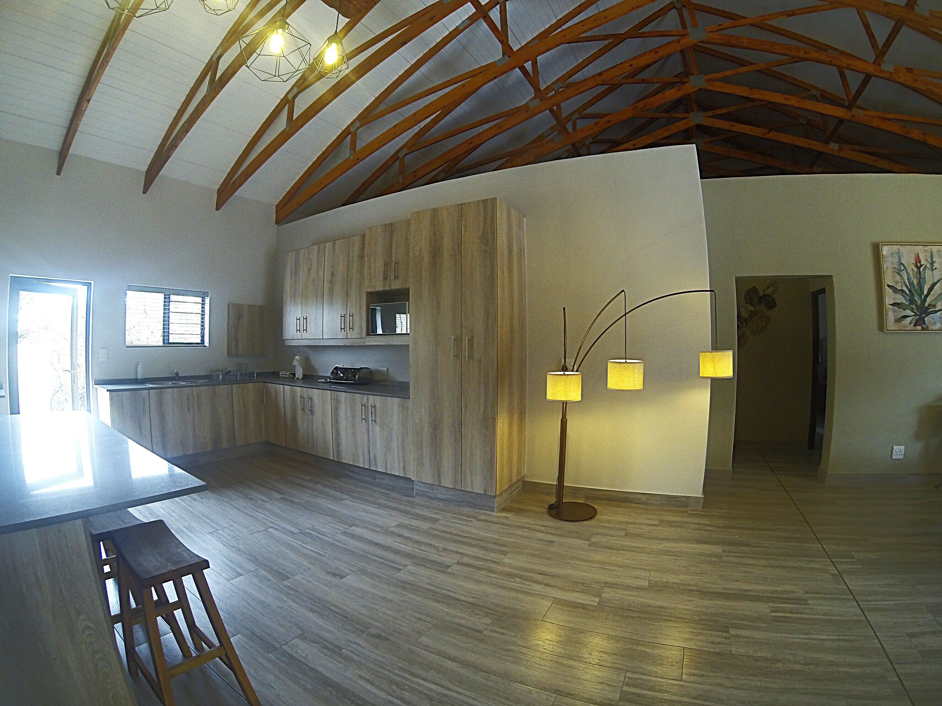 Executive Chalet, Patio, Park View | Private kitchen | Highchair