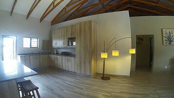 Executive Chalet, Patio, Park View | Private kitchen | Highchair