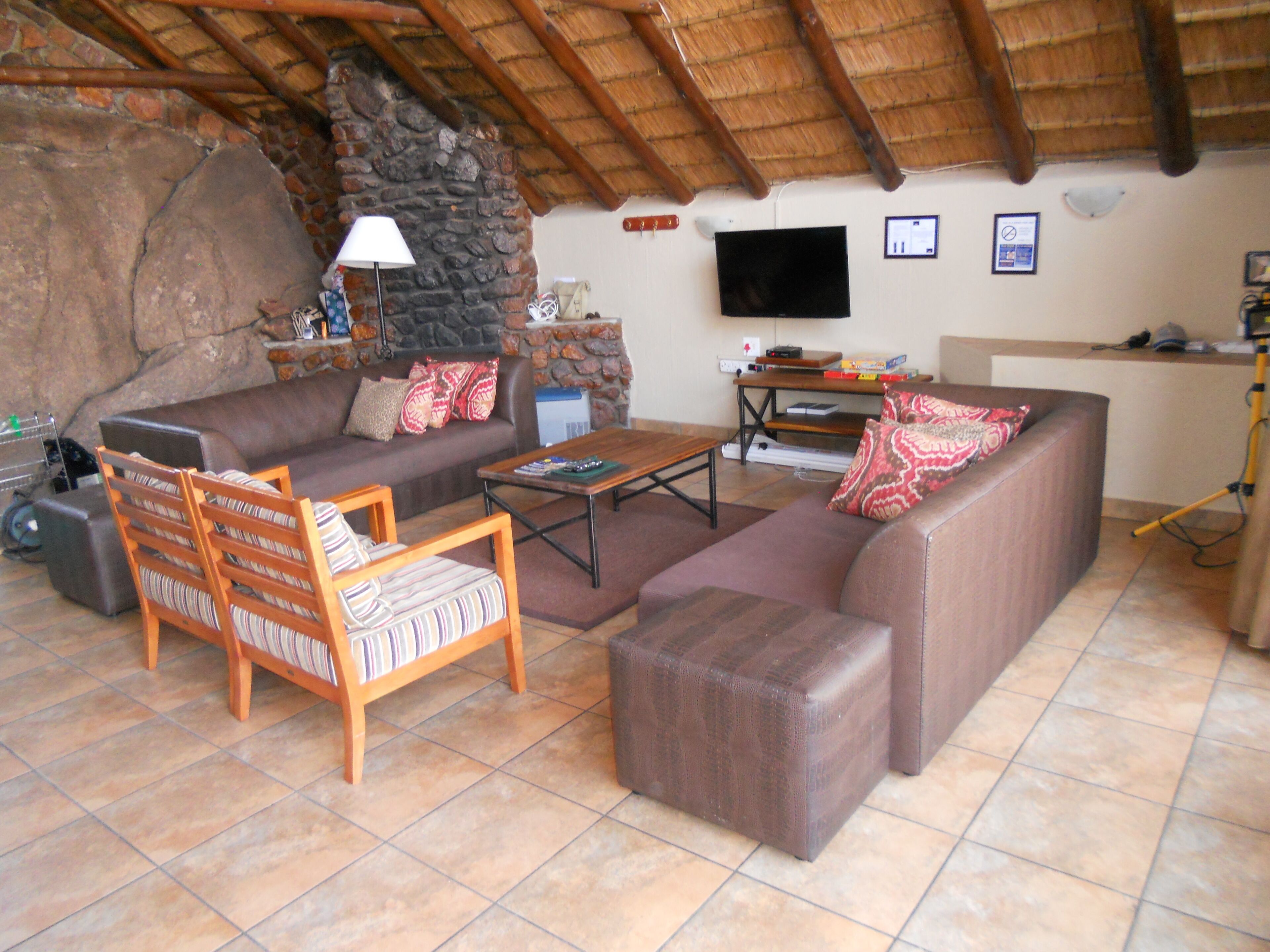 Family Villa | Living area | 32-inch plasma TV with cable channels