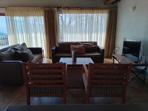 Family Chalet | Living area | 32-inch plasma TV with cable channels - BushTime at Mabula (Bela-Bela, Limpopo)