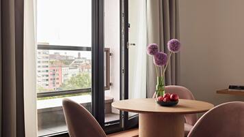 Large Studio, Kitchenette, Balcony | Living area | 43-inch flat-screen TV with satellite channels, TV