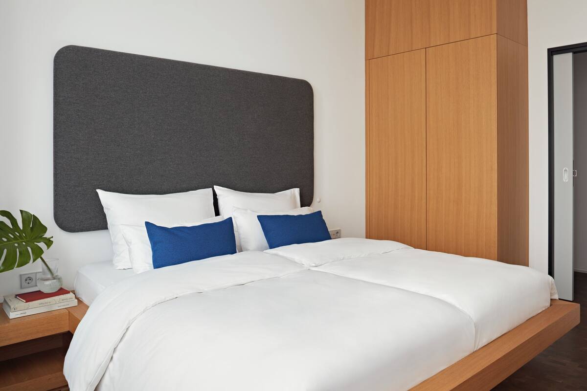 Suite | 1 dormitorio, ropa de cama de alta calidad, caja fuerte y escritorio