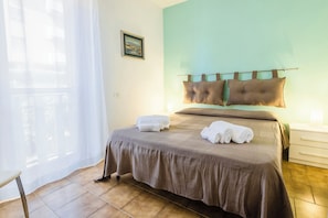 Bloc d'apartaments Deluxe | Caixa forta a l'habitació, escriptori, wifi gratuïta i roba de llit 