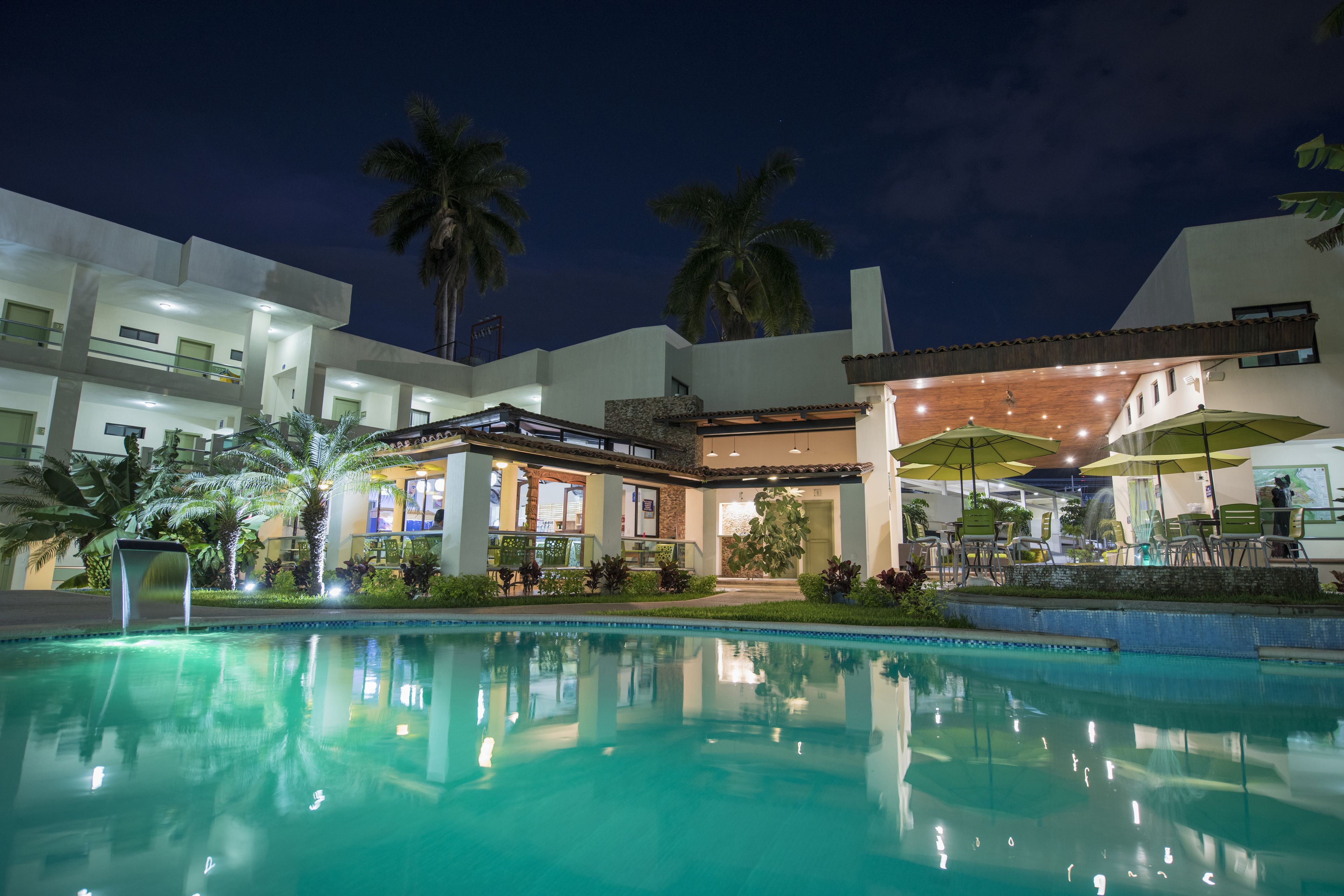 outdoor pool, open 8:00 am to 9:00 pm, pool umbrellas, pool loungers