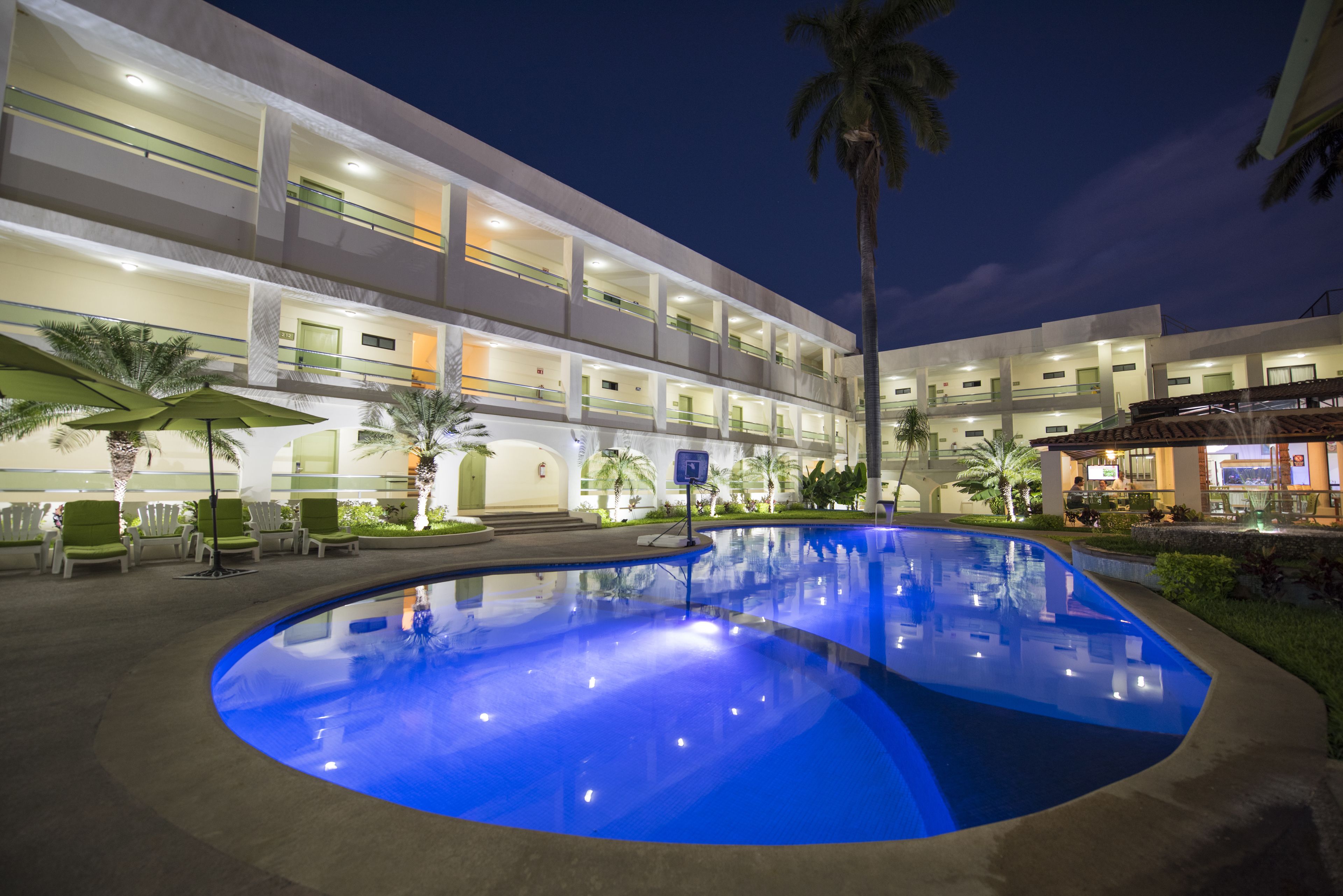 outdoor pool, open 8:00 am to 9:00 pm, pool umbrellas, pool loungers