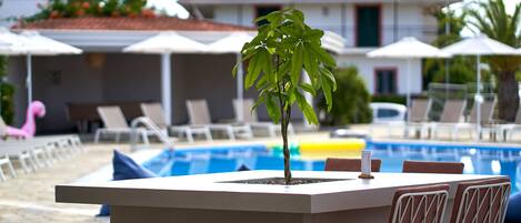 Breakfast, lunch, dinner served; international cuisine, pool views