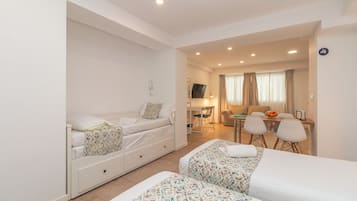 Family Studio | 1 bedroom, down comforters, desk, laptop workspace