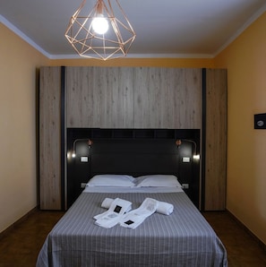 Appartement, 1 slaapkamer | 1 slaapkamer, een strijkplank/strijkijzer, gratis wifi