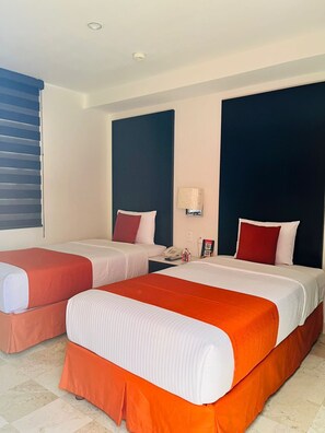 Standard Room, 2 Single Beds | In-room safe, blackout curtains, iron/ironing board, bed sheets - Hotel del Pescador (Jocotepec)
