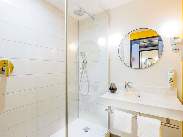 Rainfall showerhead, eco-friendly toiletries, hair dryer, towels