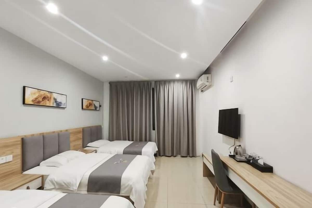 Premium bedding, pillowtop beds, desk, blackout drapes