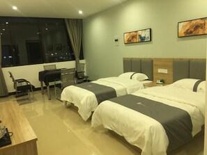 Premium bedding, pillowtop beds, desk, blackout drapes