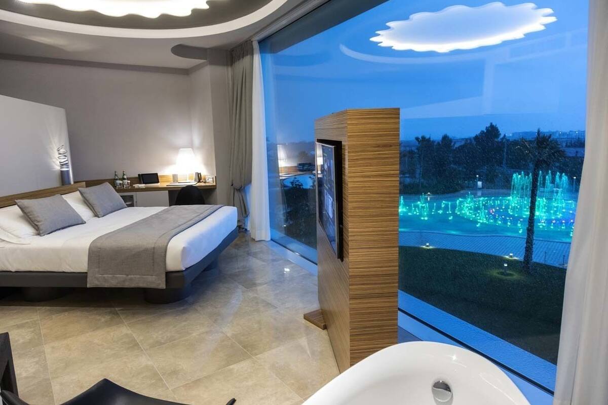 Suite, Bathtub | Minibar, in-room safe, desk, laptop workspace