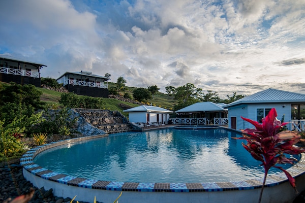 Outdoor pool, open 9:00 AM to 9:00 PM, sun loungers