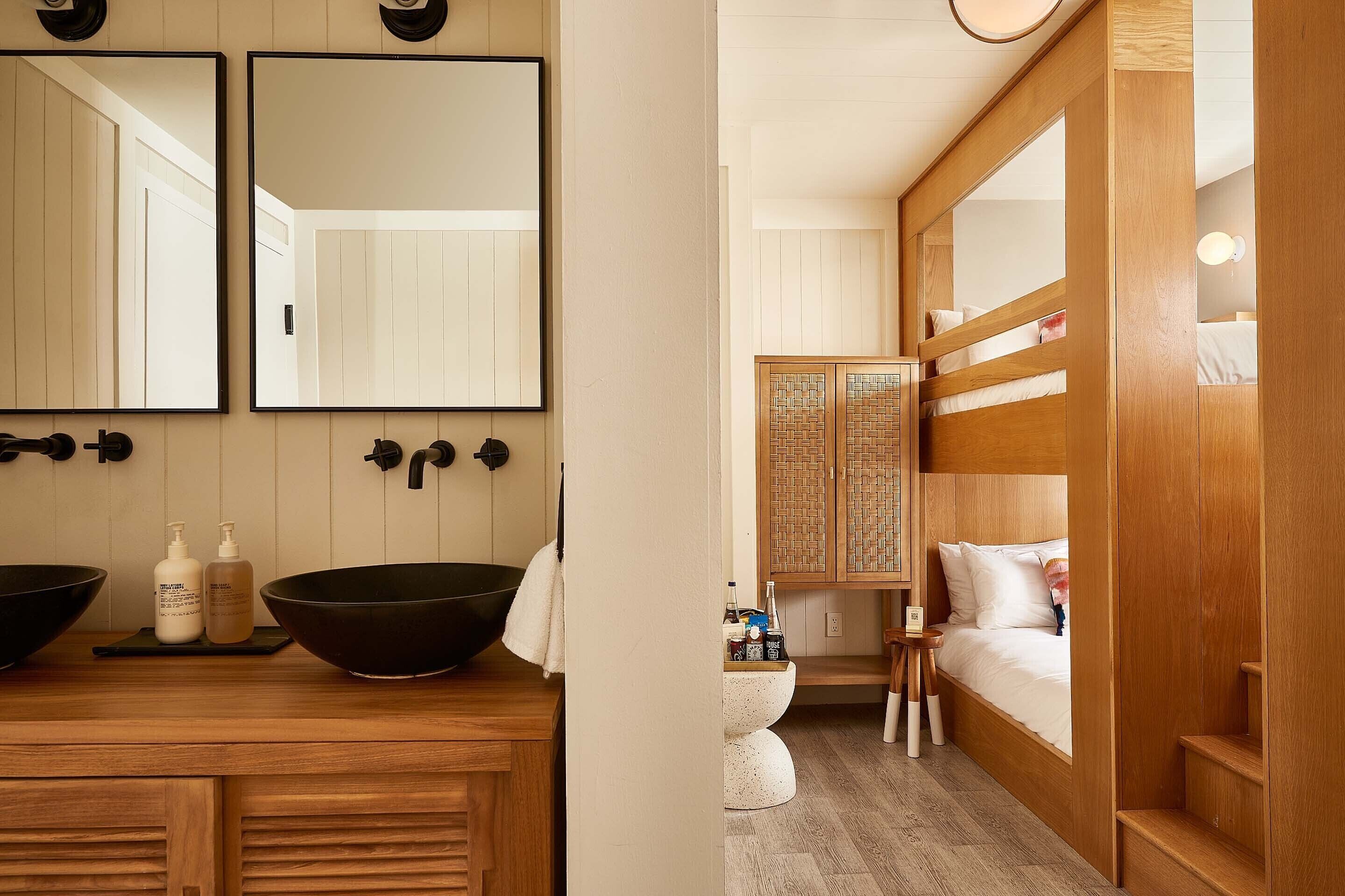 artist's loft | bathroom | shower, rainfall showerhead, designer toiletries, hair dryer