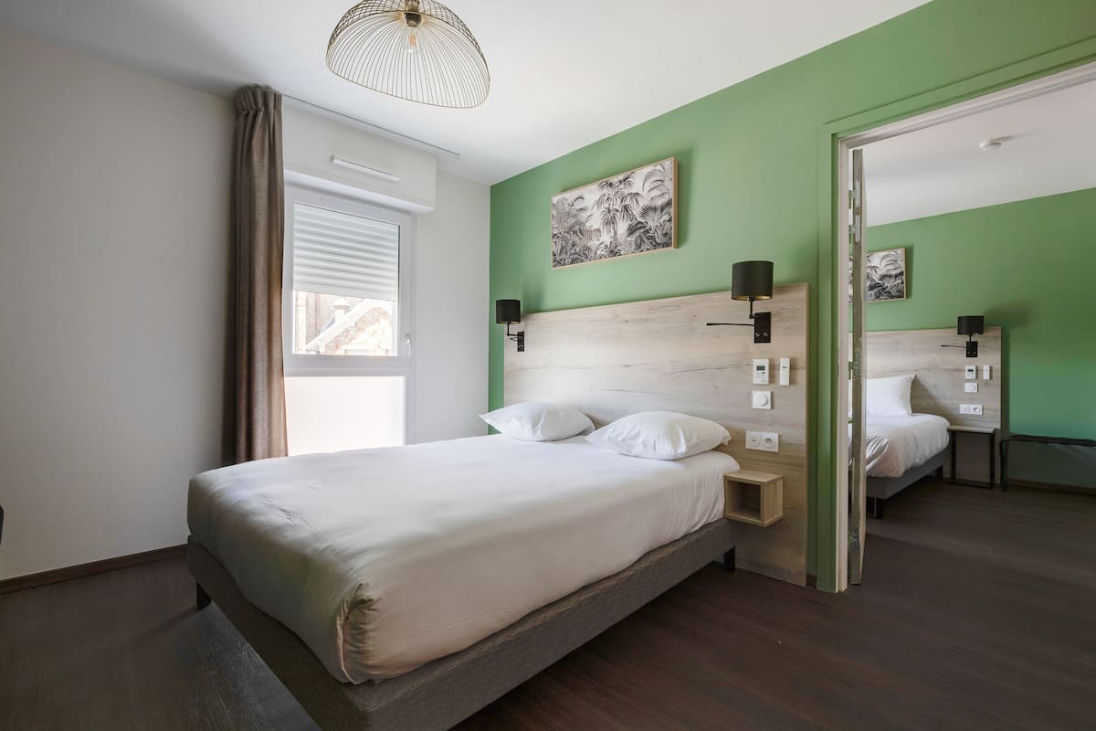 Studio, 2 Bedrooms | Premium bedding, desk, laptop workspace, soundproofing