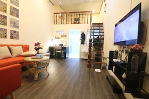 Living area - Lamie House: Indochine Style, Mezzanine 1BRMezzanine near the My Khe Beach (Da Nang)