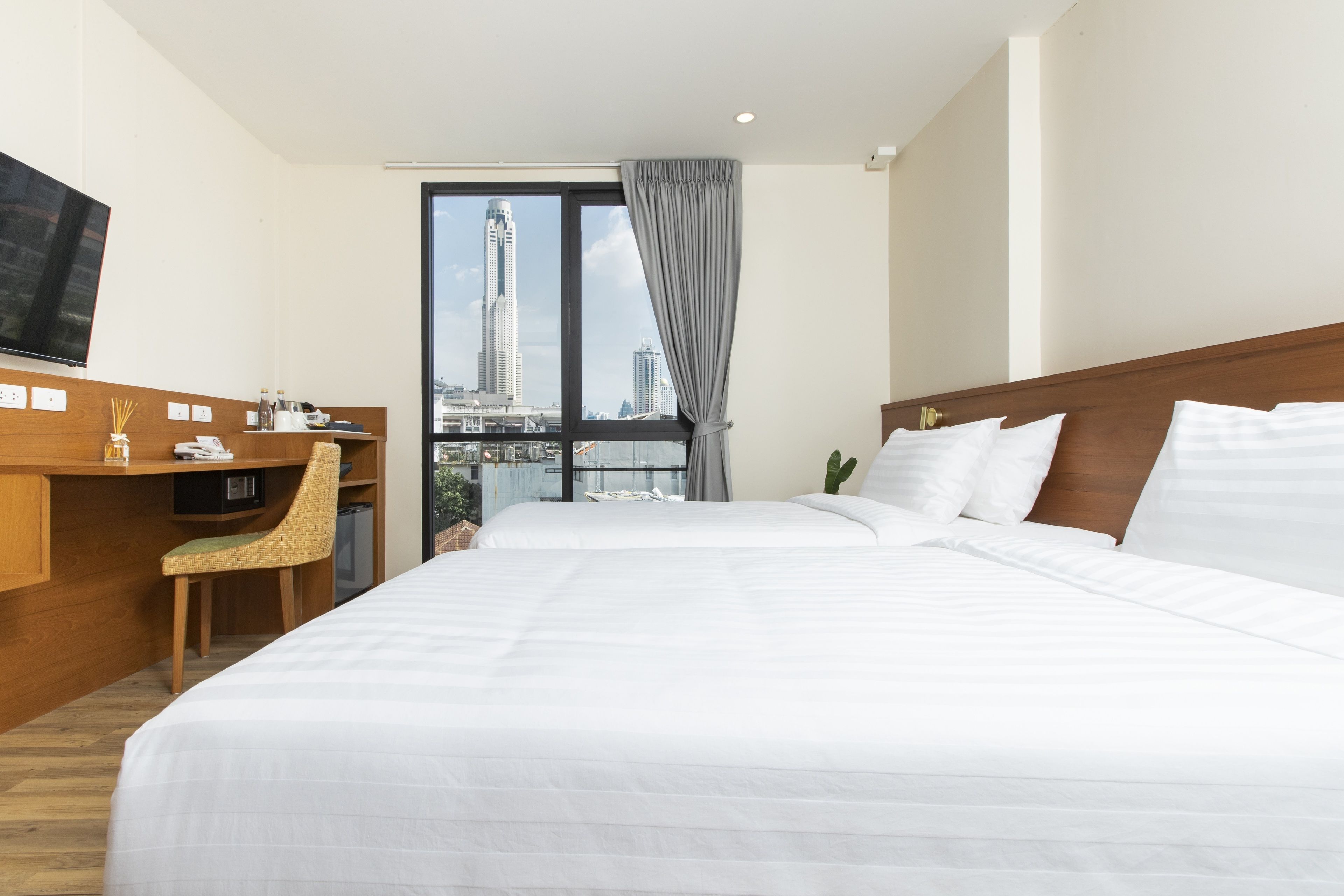 Deluxe Room, Non Smoking, City View | Premium bedding, in-room safe, desk, blackout drapes