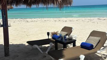 Beach nearby, sun loungers, beach umbrellas, beach towels
