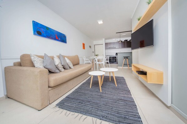 32-inch flat-screen TV with cable channels, LED TV