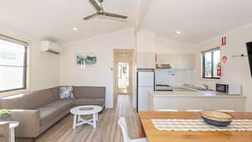 Deluxe Riverfront 3 Bedroom Villa - Not Pet Friendly | Living area | Flat-screen TV