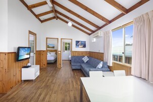 Standard Riverview 2 Bedroom Spa Villa - Not Pet Friendly | Living area | Flat-screen TV