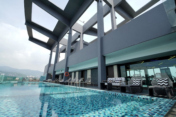 Outdoor pool, pool umbrellas, sun loungers