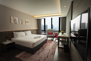 Ropa de cama de alta calidad y minibar 