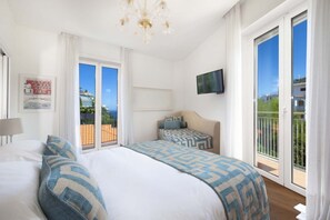 3 bedrooms, memory foam beds, iron/ironing board, travel crib