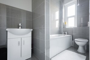 Bañera, secador de pelo