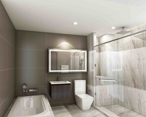 A modern bathroom with a bathtub, toilet, vanity, and a walk-in shower. - Secret Mori Hotel (Bangkok)