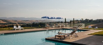 OLIVO apartment, 180 sqm, with private porch and shared swimming pool.