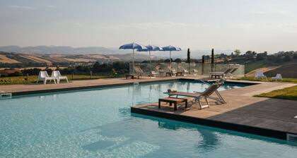 OLIVO apartment, 180 sqm, with private porch and shared swimming pool.