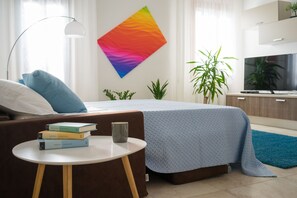 1 bedroom, desk, iron/ironing board, travel crib