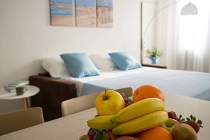 1 bedroom, desk, iron/ironing board, travel crib