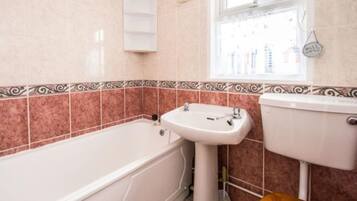 Combined shower/tub, towels, soap, toilet paper