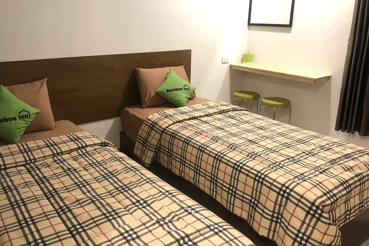 Desk, laptop workspace, free WiFi, bed sheets