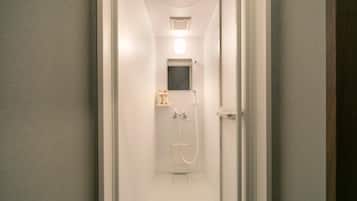 Shower, free toiletries, hair dryer, slippers