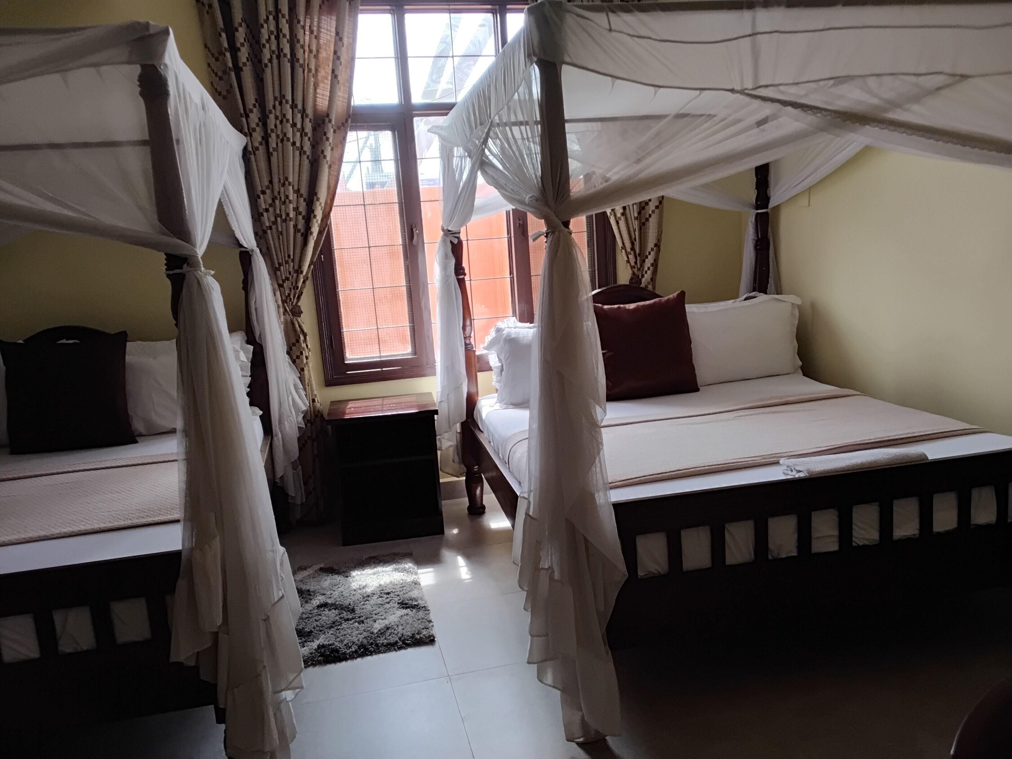 Standard Quadruple Room | Desk, laptop workspace, free WiFi, bed sheets