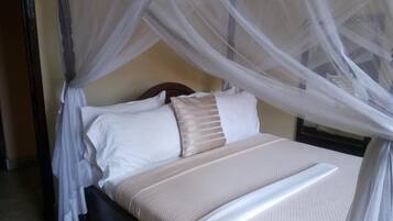 Desk, laptop workspace, free WiFi, bed sheets