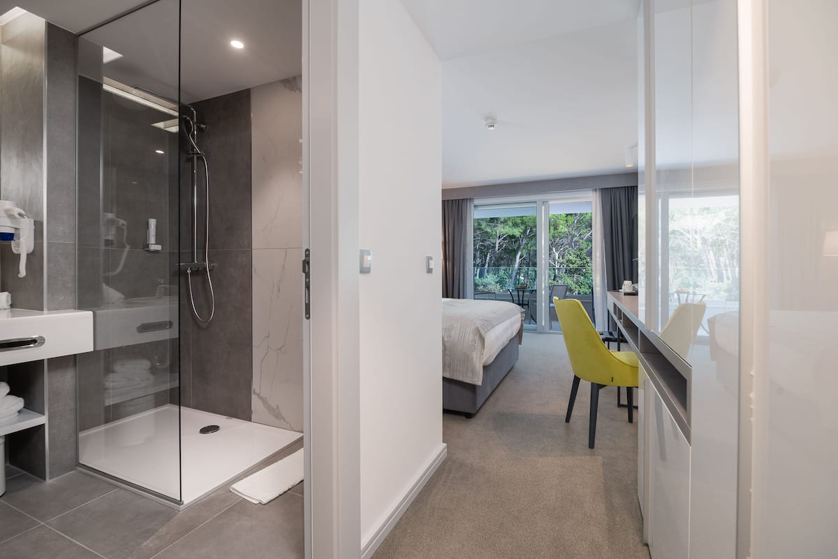 standard double room, park view | 1 bedroom, minibar, in-room safe, desk