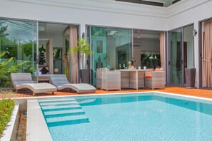 Outdoor pool, sun loungers