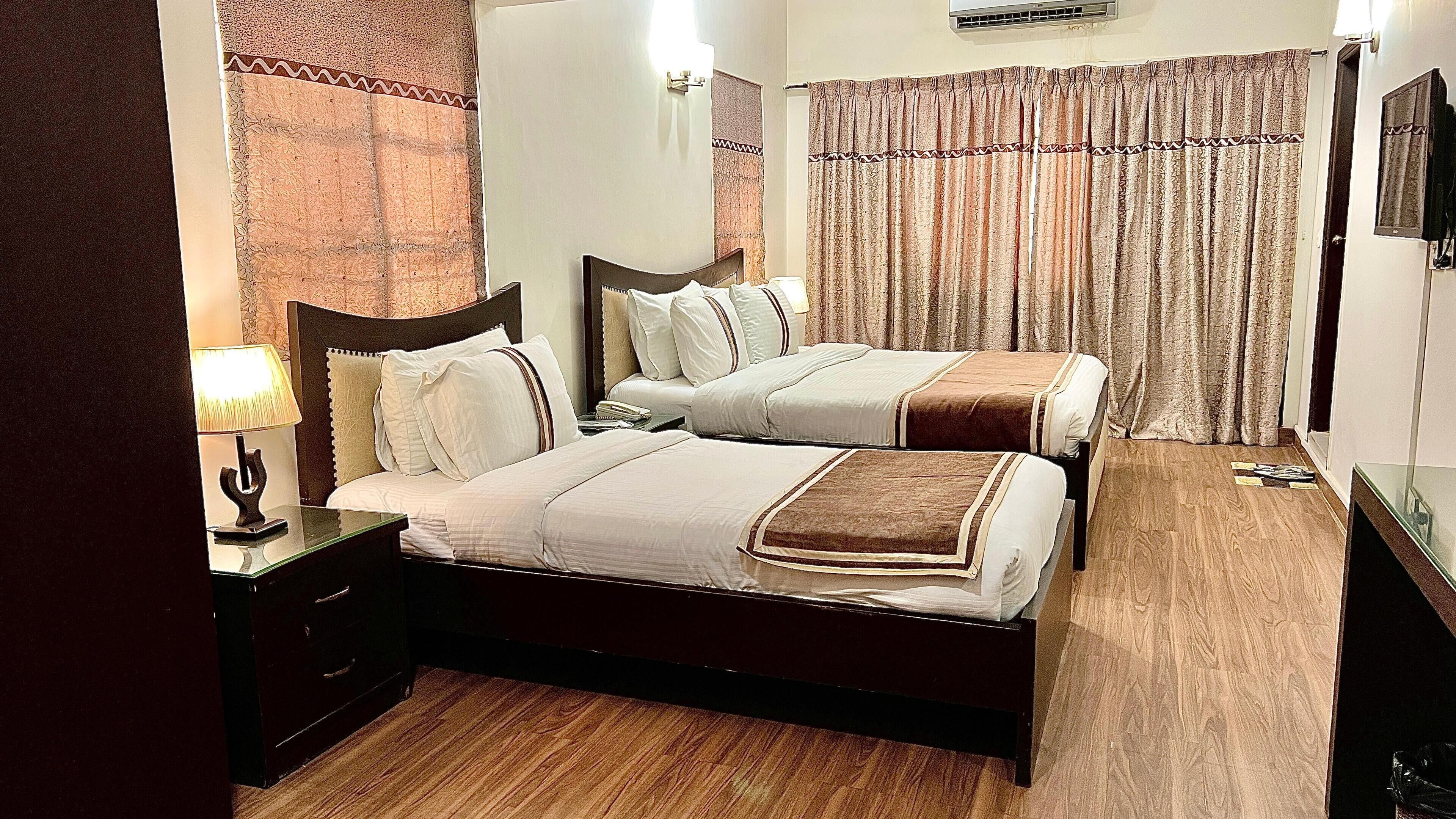 Family Triple Room, Accessible, Non Smoking | Desk, blackout curtains, soundproofing, free WiFi