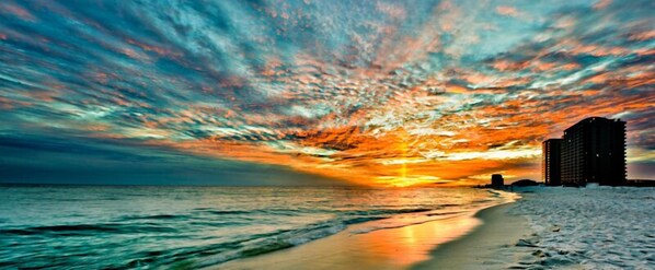 On the beach, sun-loungers
