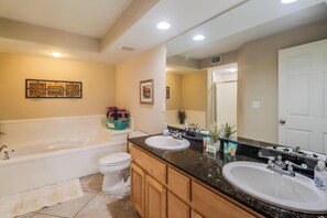 Shower, jetted tub, towels