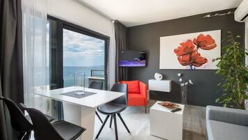 Standard Apartment, Sea View | Living area | Smart TV